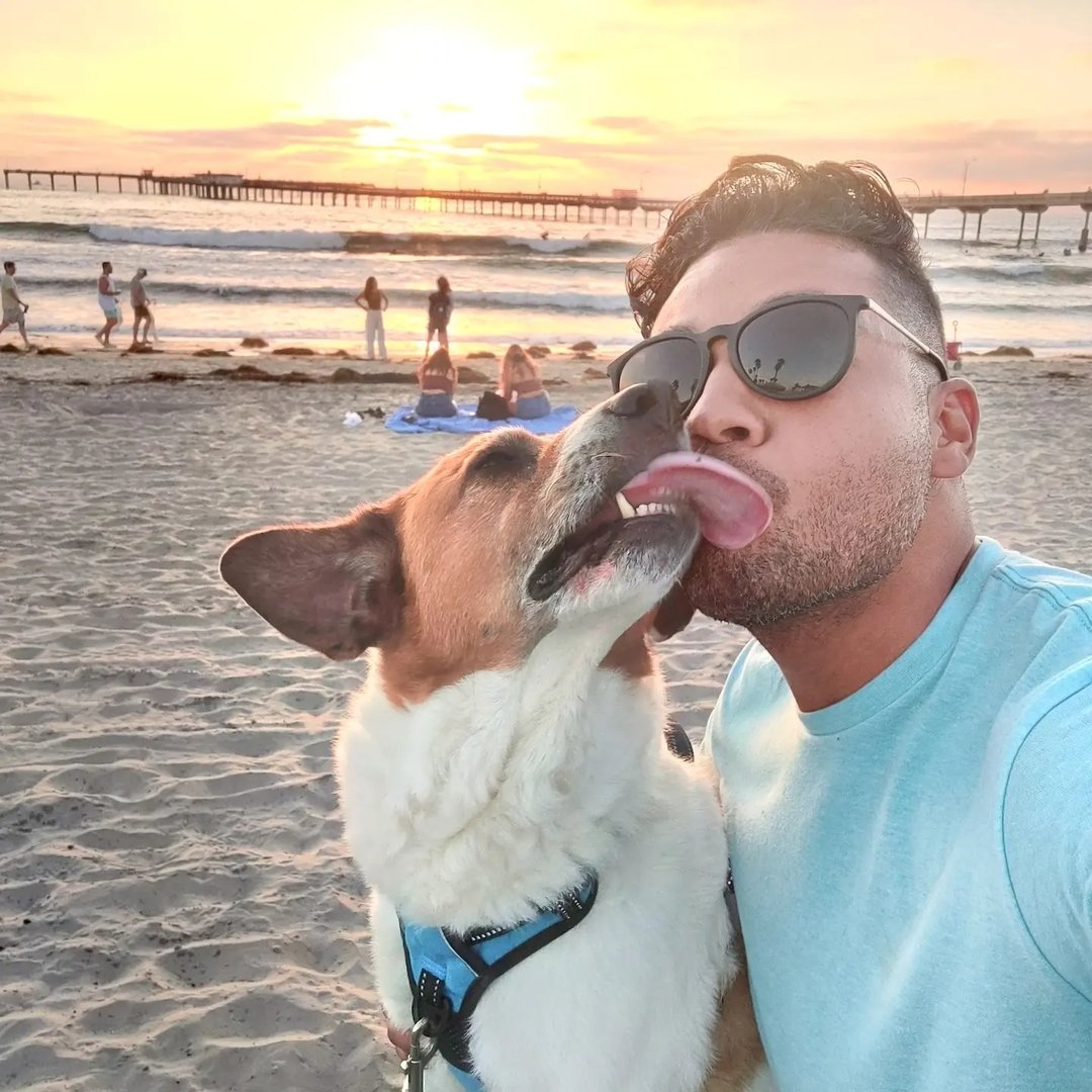 Marcus with his dog Ollie at Ocean Beach
